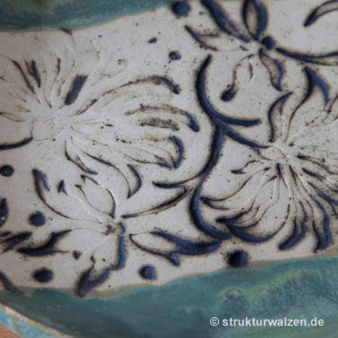 Muster 1602 in Keramik prägen